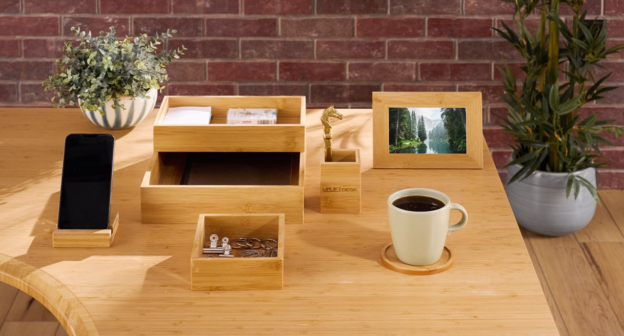 Eco Curve Bamboo Desktop by UPLIFT Desk including a matching Bamboo Organizer Set.