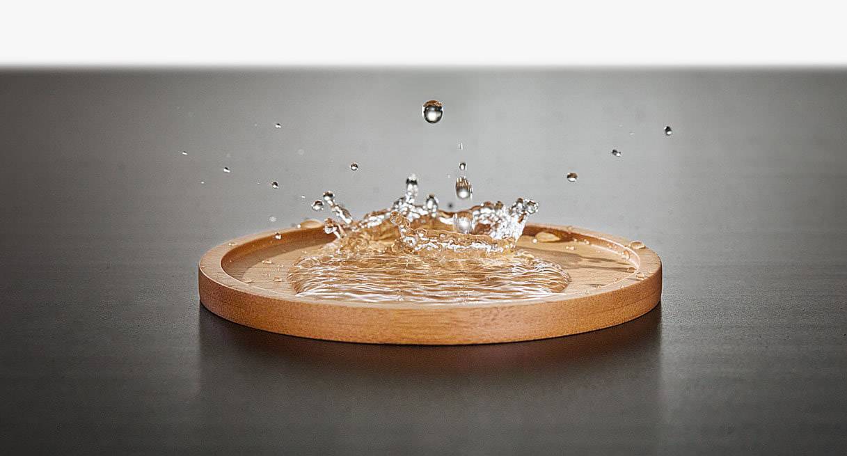 Naturally water-resistant, the bamboo coasters protect desks, tables, and countertops from water damage