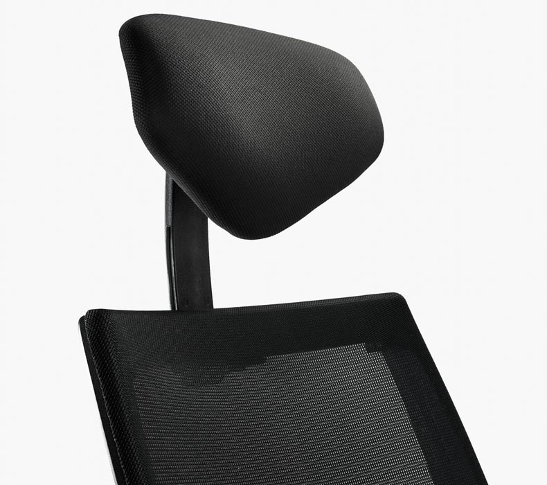 The Height adjustable headrest of a Facet Ergonomic Chair