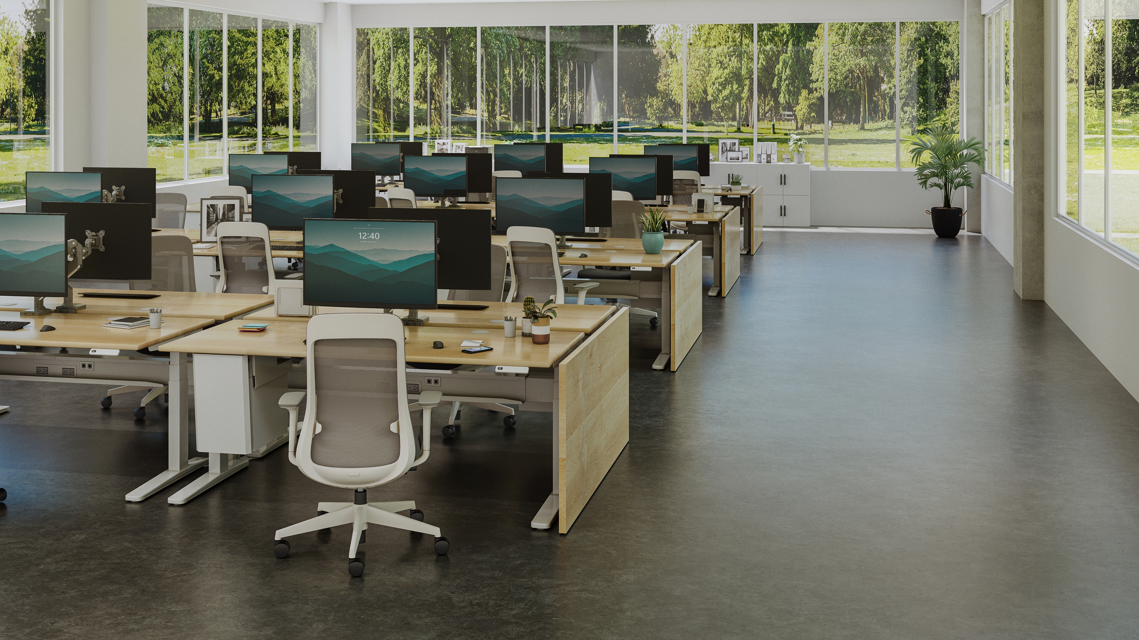 Business office outfitted by UPLIFT Desk with height adjustable desks, ergonomic chairs, and office accessories.