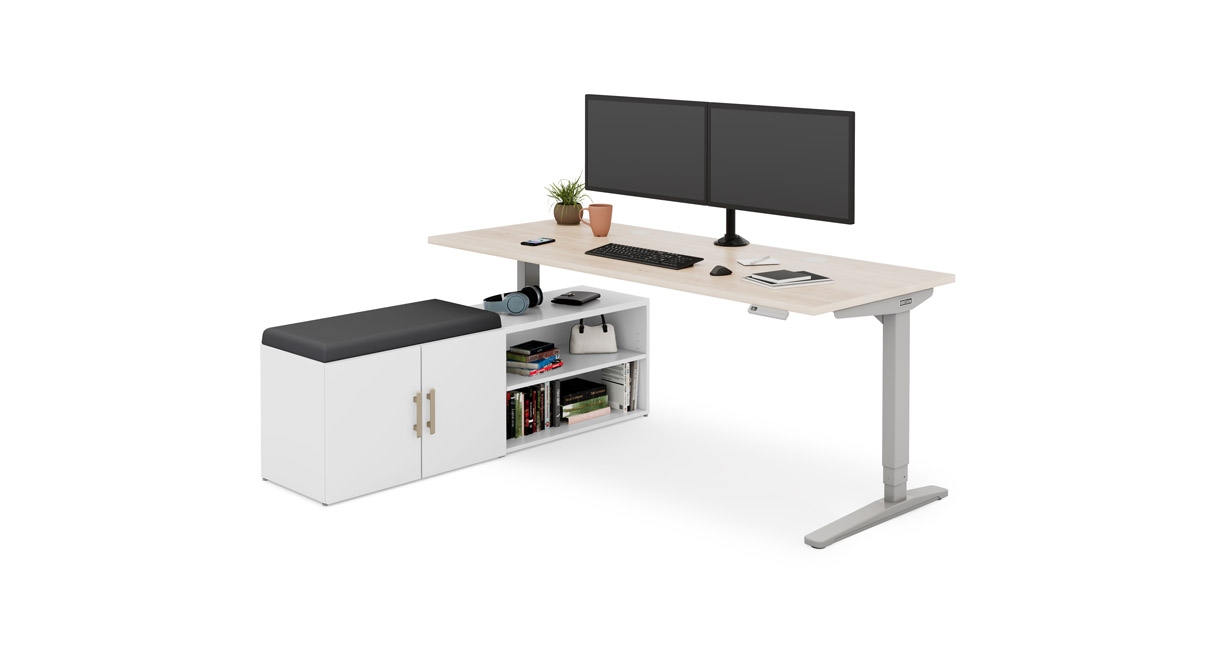 White MoPac Credenza with seat cushion beside a 72" x 30" Maple Laminate UPLIFT Standing Desk