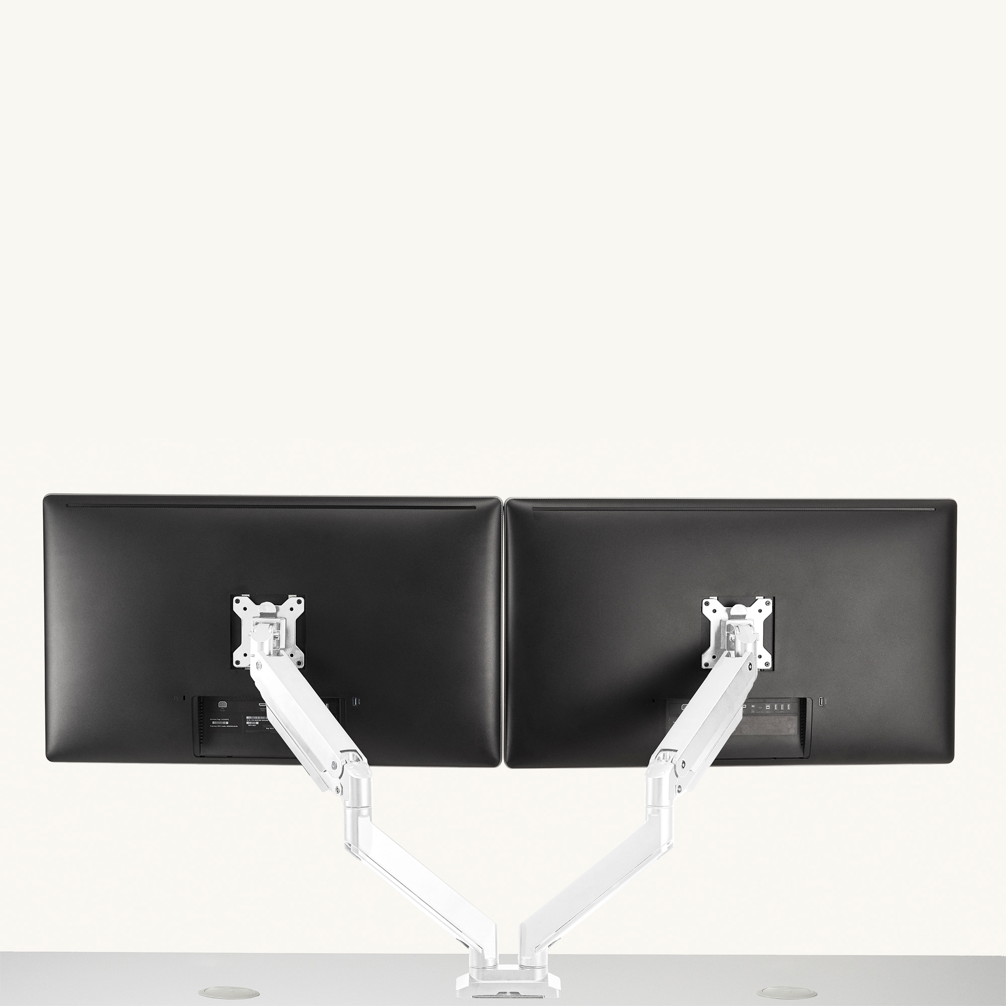 White Crestview Dual Monitor Arm holding two monitors.