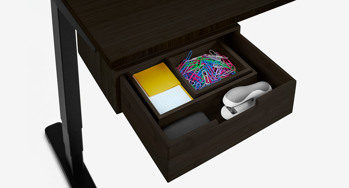 A black bamboo desk drawer shown open with bamboo desk organizer inside