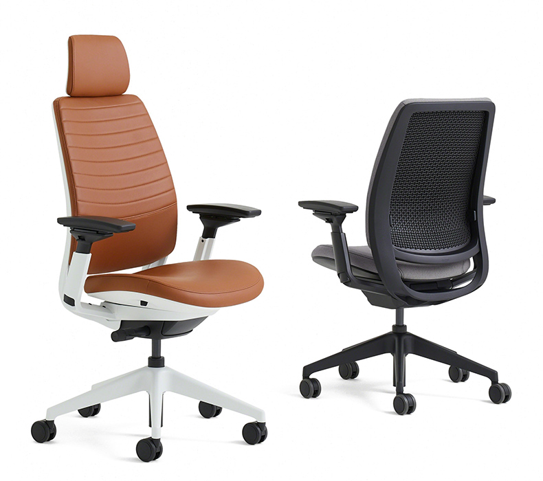 Two Steelcase Series 2 ergonomic office chairs, one in leather with a headrest and one in black without a headrest