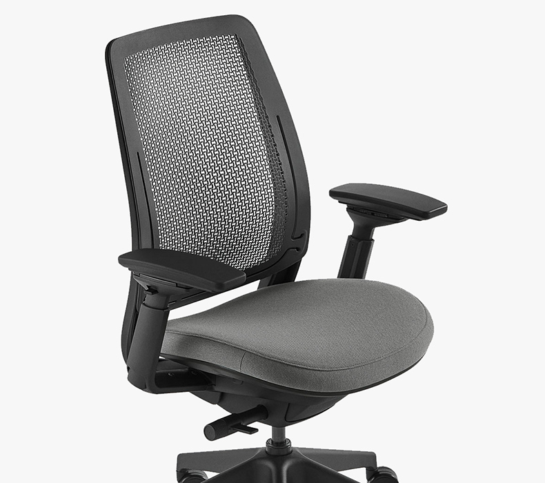 The Steelcase Series 2 ergonomic office chair in black showing the pattern of the supportive Microknit back