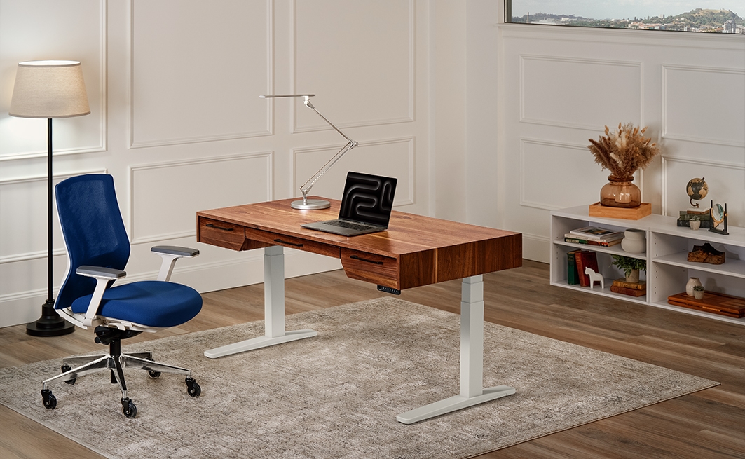 The Narrative Standing Desk in a cozy office setting.
