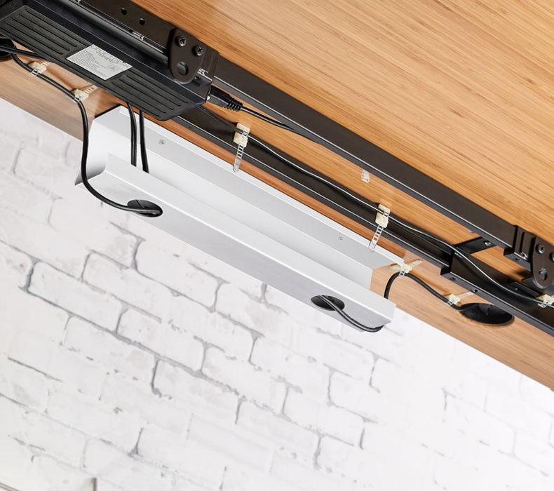 Desk Frame Wire Management Tray attached to a Bamboo UPLIFT Desk