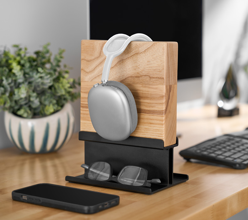 A Headphone Stand with an Ash Solid Wood block sitting atop a Birch Butcher Block UPLIFT Standing Desk