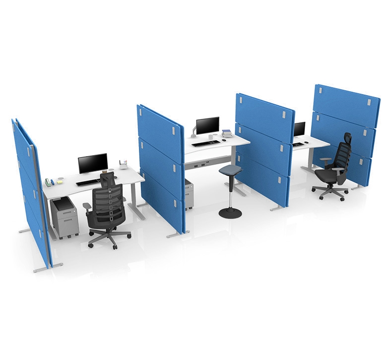 A socially distanced row of white Greenguard-Gold Laminate Standing Desks separated by OneWall Mobile Acoustic Office Partitions