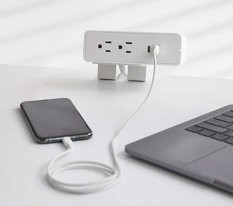 Humanscale NeatHub charging a phone