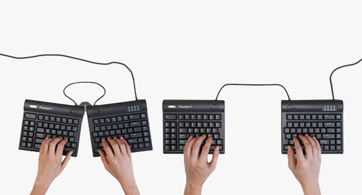 A side by side view of a split and splayed Kinesis Freestyle2 Ergonomic Keyboard