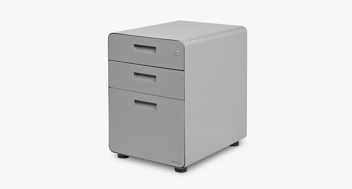 An UPLIFT 3-Drawer Filing Cabinet in industrial style with closed drawers that have inlaid handles