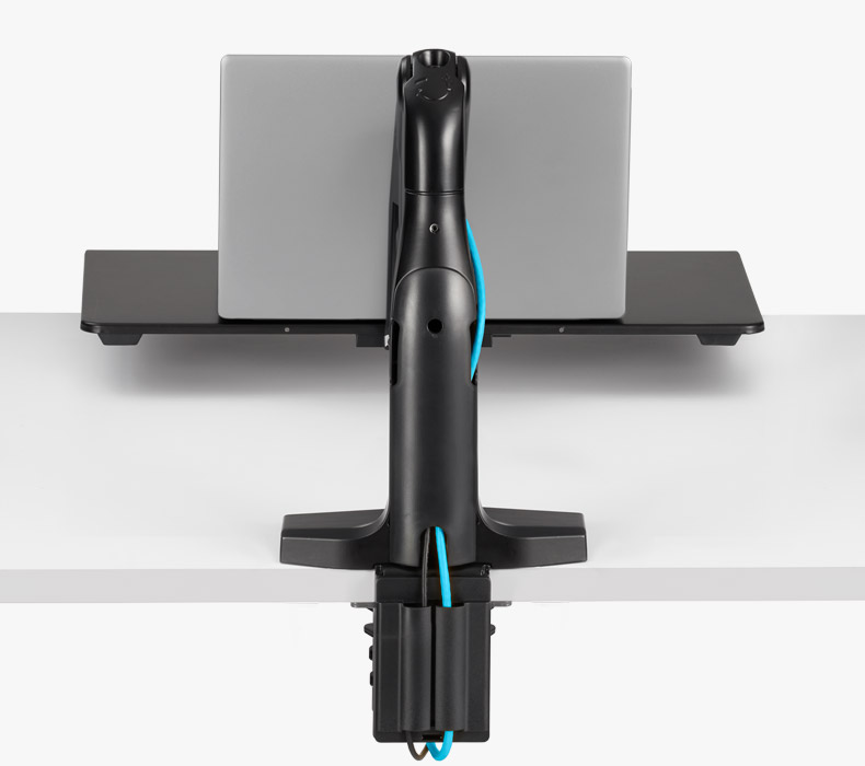 Monitor cables routed through the integrated cable management channels of a Swing Laptop Sit/Stand Workstation