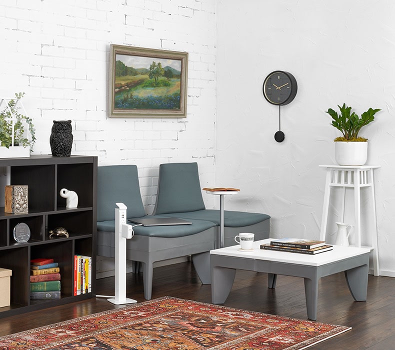 A lounge area with Power Tower by UPLIFT Desk