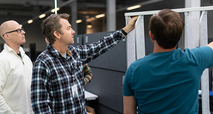 CPE and CEO of UPLIFT Desk Jon Paulsen working with designers