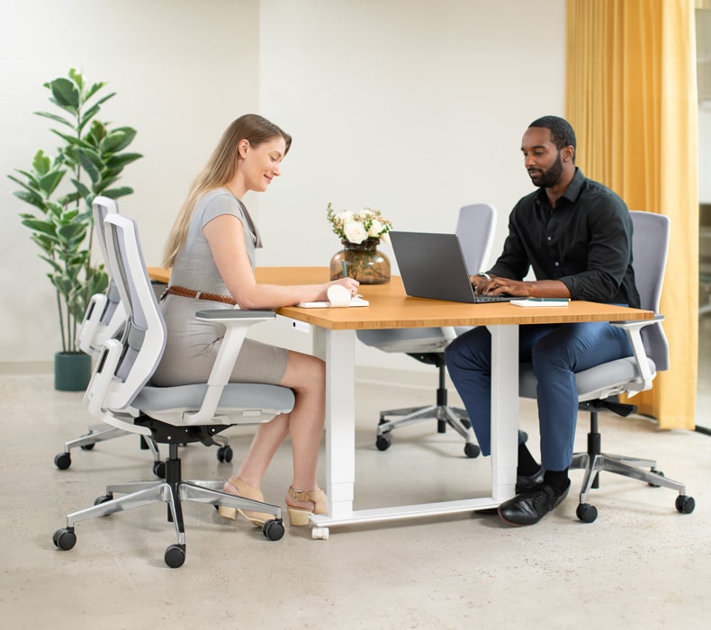 Adjustable Height Conference Table in an office space
